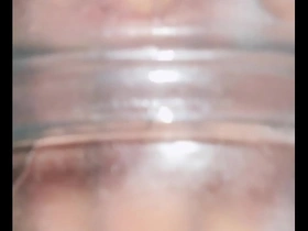 Gay Asian man uses fleshlight with sucking and cock stimulation.
