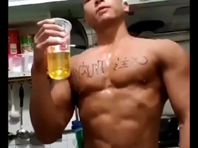 Gay Asian man enjoys piss play