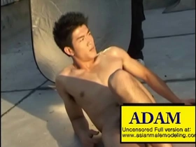 Adam, the hot Asian guy who works out and poses for the camera.