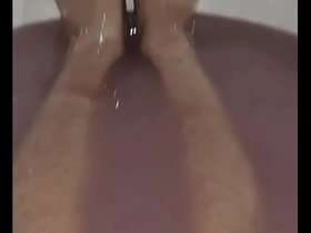 Magenta slime bath time is here to tickle your feet and other body parts.
