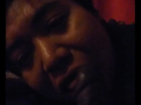 Gay blowjob scene with a black guy and a white guy.