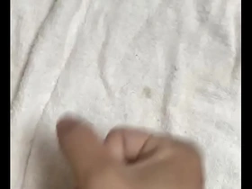 Gay Japanese man masturbates and ejaculates.