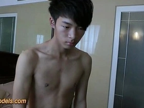 Small and skinny Asian boy masturbates after taking a shower.
